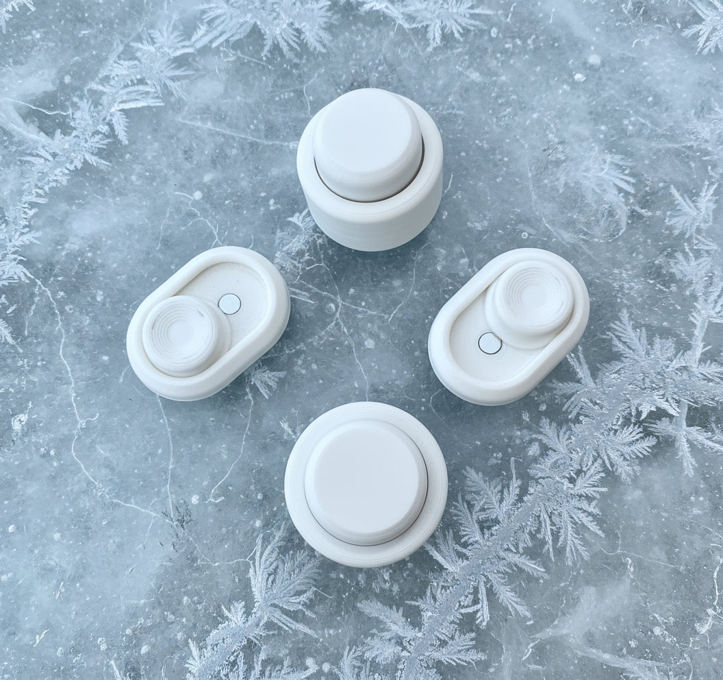 Snappy Frost Bite Toy - Limited Edition Fidget Keychain in white, shown in Classic and Click styles on icy background. Ideal executive toy for stress relief.