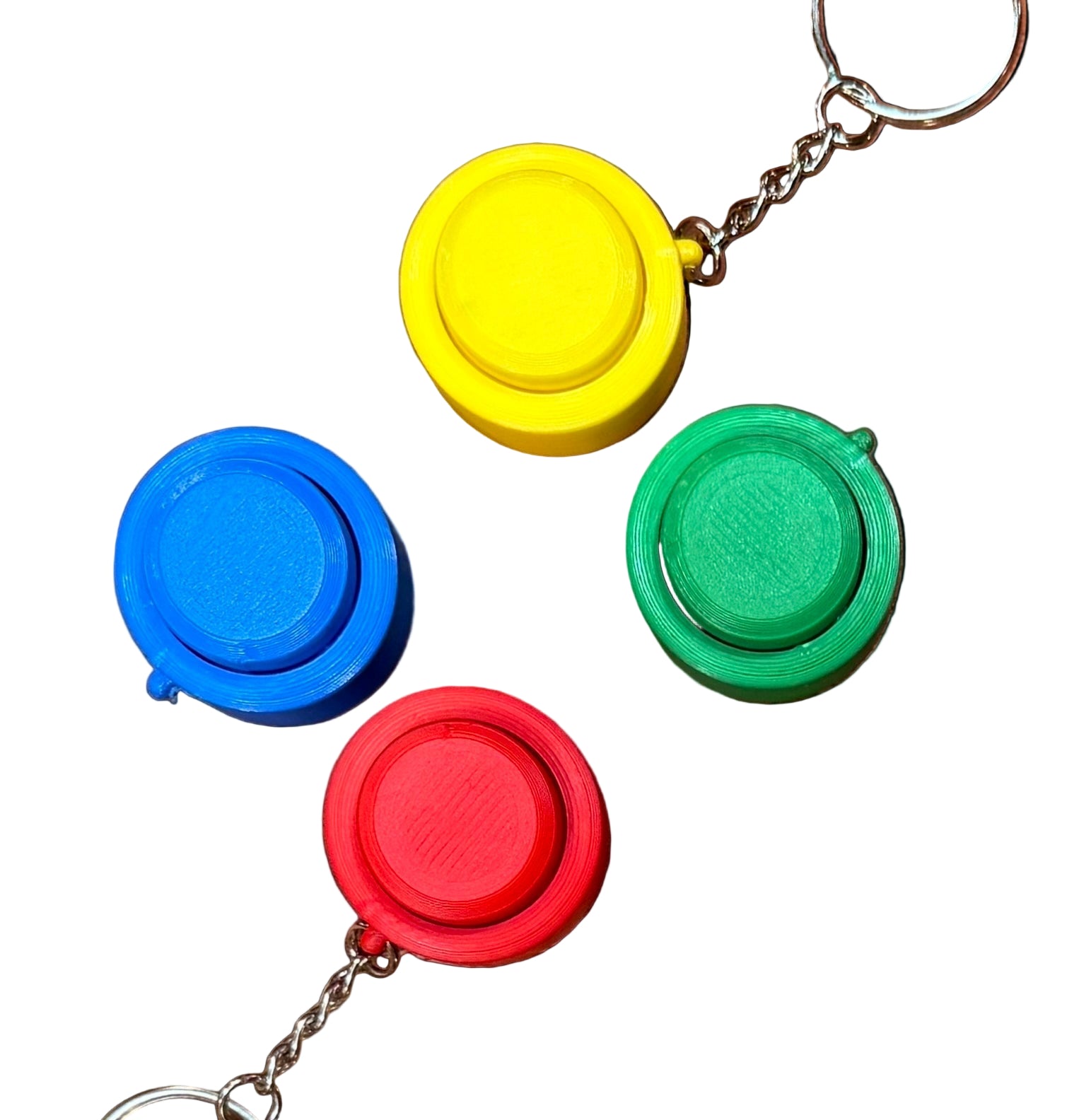 Snappy™ Click - Portable Mechanical Keyboard Fidget in red, blue, green, and yellow with keychains. Compact tactile toy for stress relief.