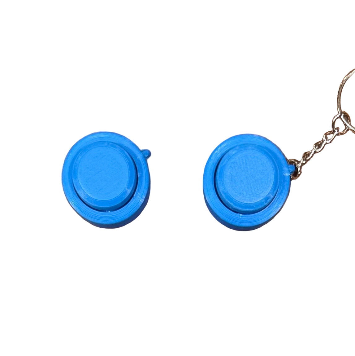 Blue Snappy™ Click mechanical keyboard fidget shown in two pieces. Ideal compact toy for tactile satisfaction.